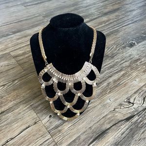 Gold tone statment necklace